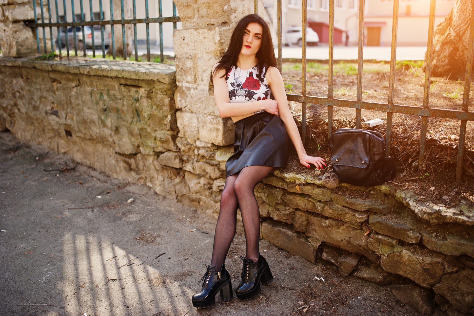 We're loving this edgy-meets-elegant look! A floral skull print top paired with a leather skirt and chunky platform boots creates the perfect industrial chic vibe. Our favourite styling secret? Contrast textures for instant edge. Visit the blog for our complete guide to mastering this look and more Newcastle-inspired fashion tips! #Fashion #Industrial #Chic #Newcastle #Grit #Into #High #Look #PinterestInspiration