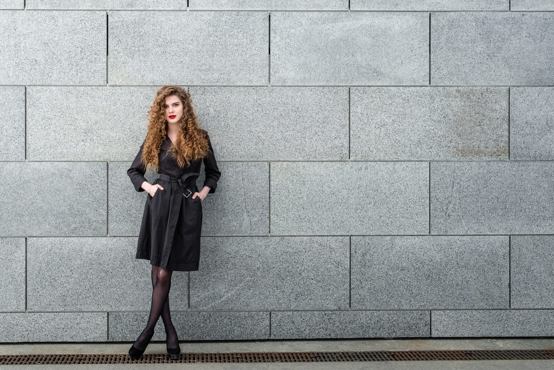 We're loving this sleek black belted coat paired with sheer tights and heels. Our favourite way to style? Add a pop of red lippy for instant glam! Discover our top tips for nailing this versatile look, from day to night. Click for the full styling guide and shopping list! #Mastering #Urban #Black #Coat #Look #Our #Street #Savvy #PinterestTips