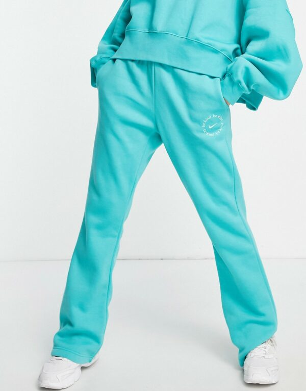 Nike Be Kind flared fleece joggers in teal-Blue