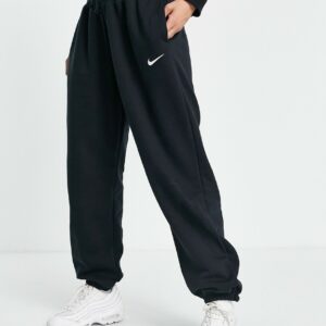 Nike mini swoosh oversized high rise joggers in black and sail