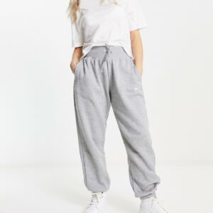 Nike mini swoosh oversized high rise joggers in grey and sail