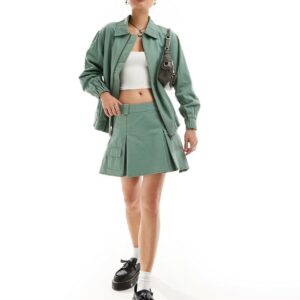 Something New X Chloe Frater denim box pleat cargo mini skirt co-ord in washed watercress green