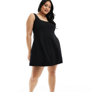 ASOS DESIGN Curve seamed mini tennis sundress in black