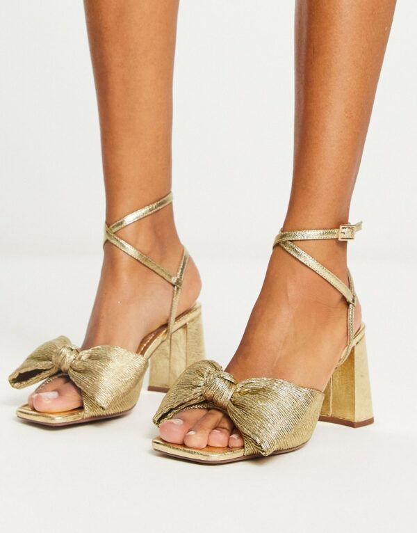 ASOS DESIGN Hitched bow detail mid block heeled sandals in gold