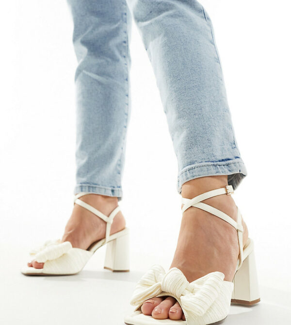 ASOS DESIGN Wide Fit Hitched bow detail mid block heeled sandals in ivory-White