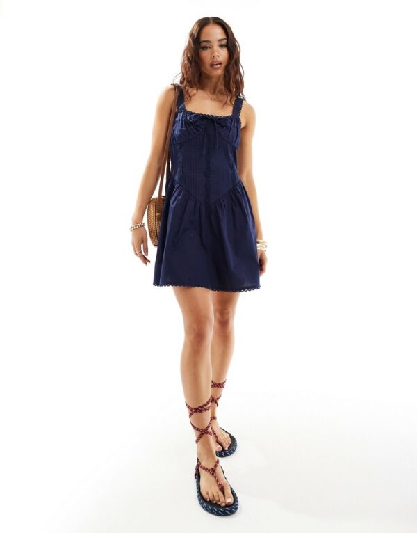 ASOS DESIGN corset bodice mini sundress with lace trims in navy blue