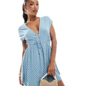 ASOS DESIGN crinkle short sleeve v neck tie front mini tea dress in blue polka dot-Multi