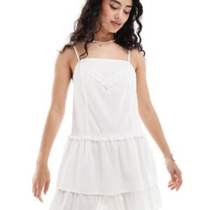 ASOS DESIGN strappy mini lace nightie dress with tiered ruffle skirt in off white