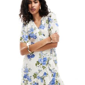 & Other Stories linen mini dress with wrap front and puff sleeves in blue floral print