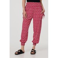 Izabel London Printed Tapered Harem Trousers women's Trousers in Red